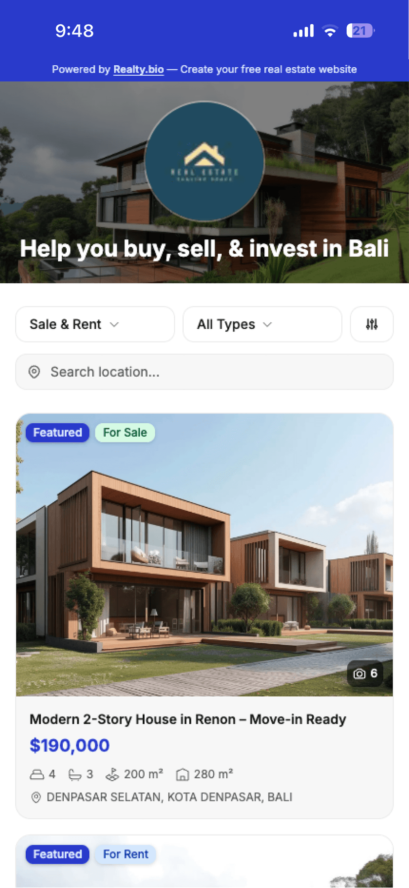Realty.bio mobile real estate website on a phone